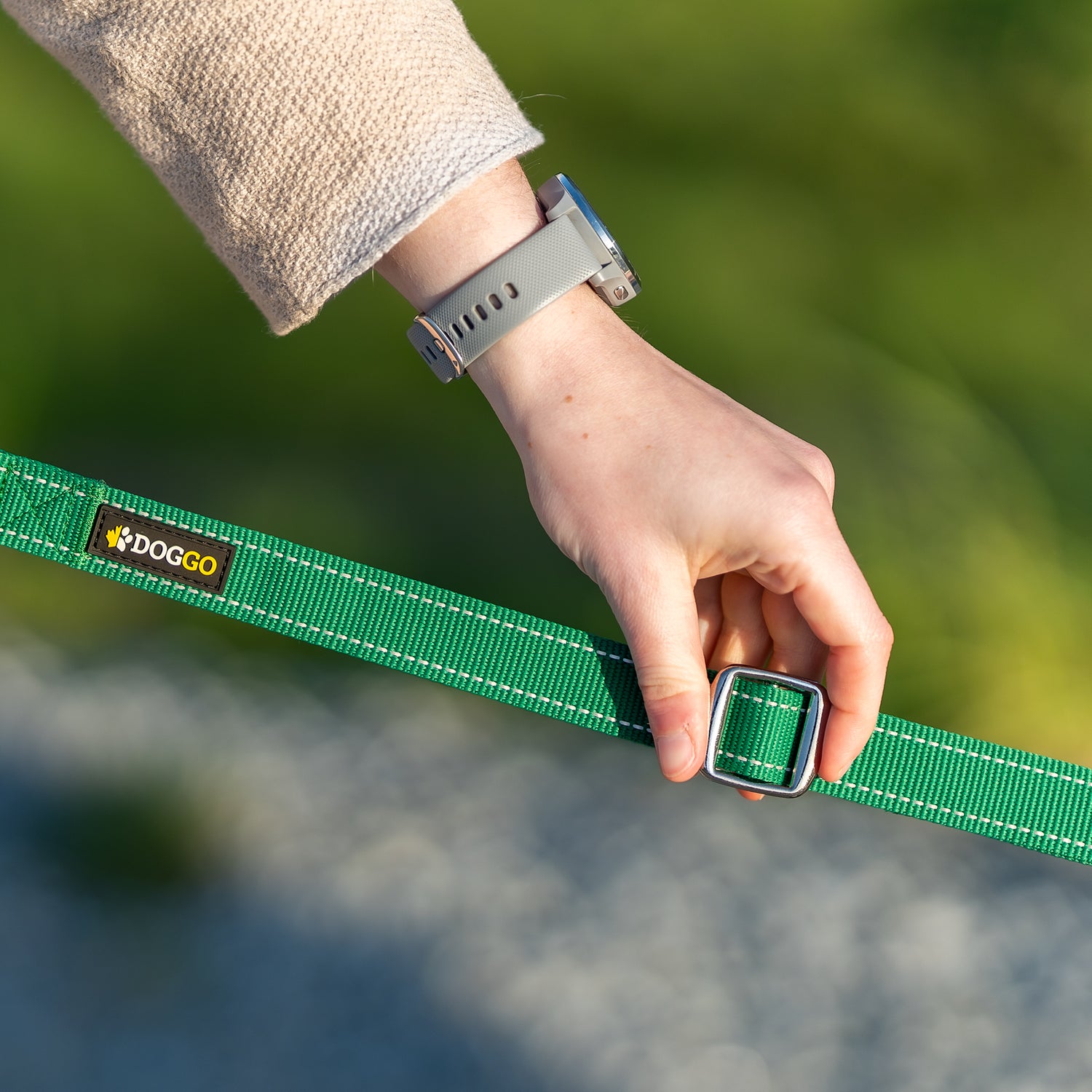 Detail photo of the adjustable slide on the DogGo Adjustable Padded Leash, in rainforest green.